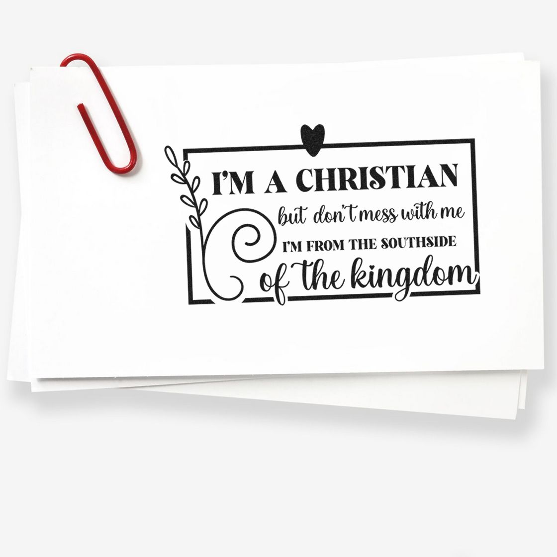 Black Christian quote stamp and seal on white cards, with red paperclip and decorative border.