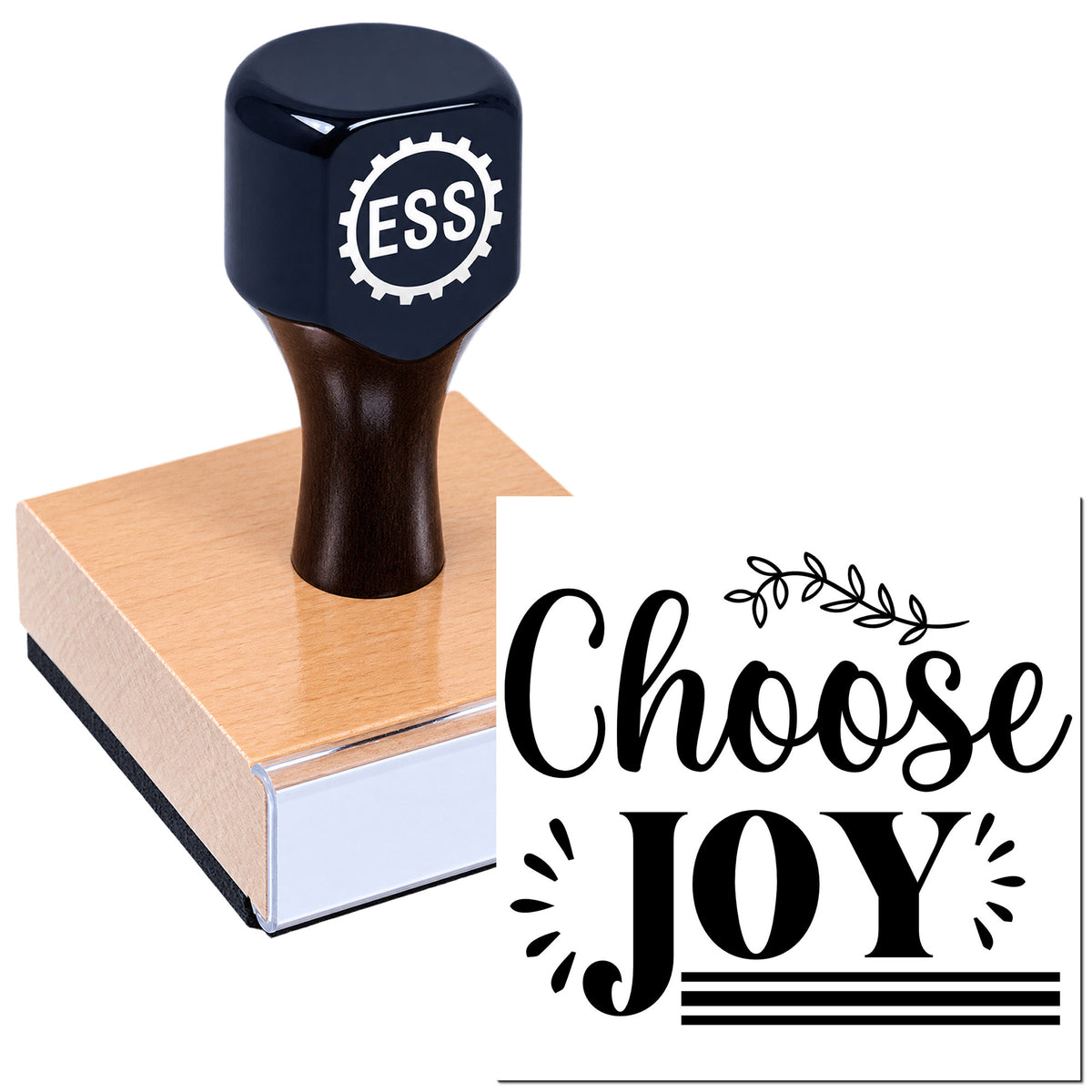 Black ESS custom rubber stamp on a wooden block, with a white "Choose Joy" seal design.