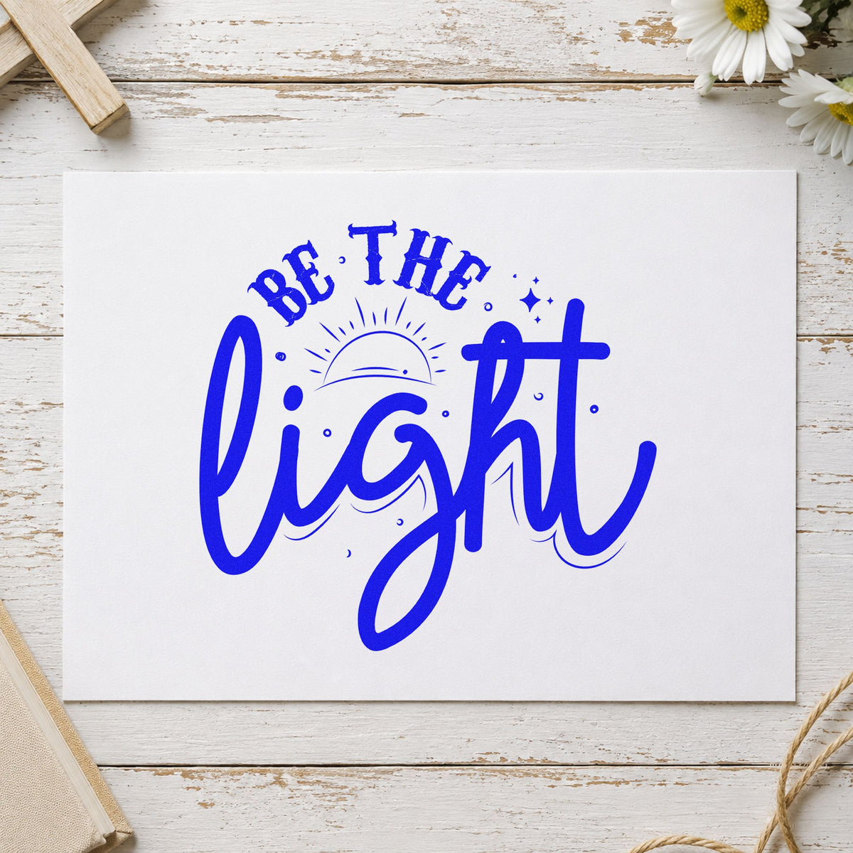 Be the Light Sunrise Script craft stamp imprinted in blue ink on paper, a design suited to mentor thank-yous.