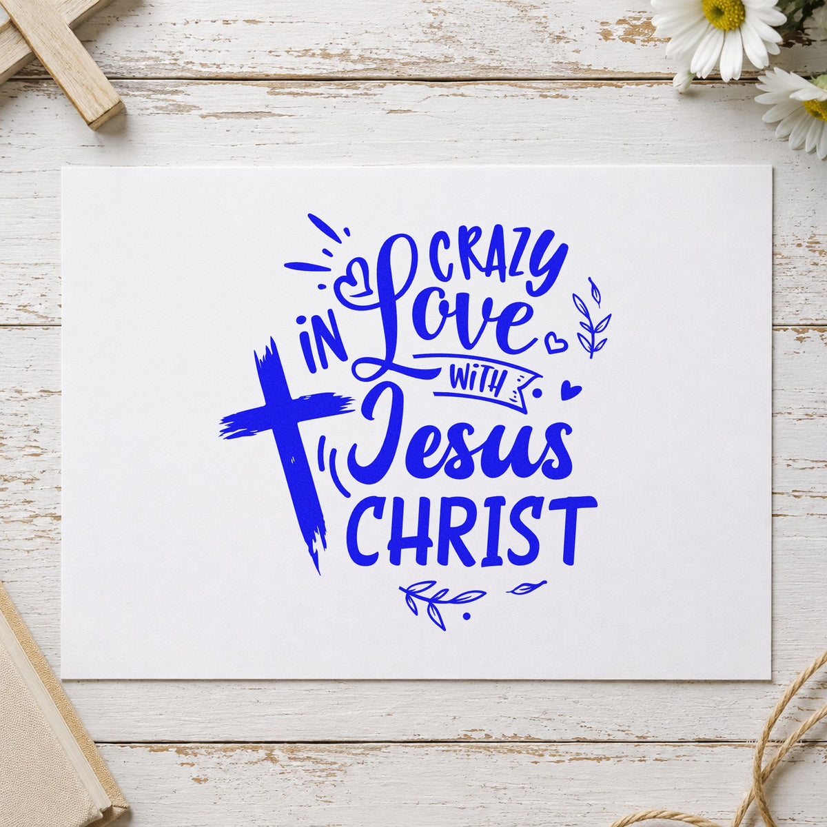 Crazy in Love Cross Left craft stamp imprinted in blue ink on paper, a design suited to kraft bag stencils.
