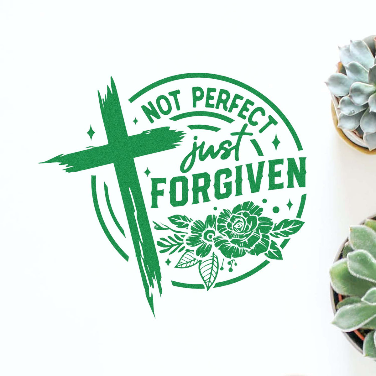 Green Not Perfect Just Forgiven stamp seal with cross, floral accents, and circular design on a white background.
