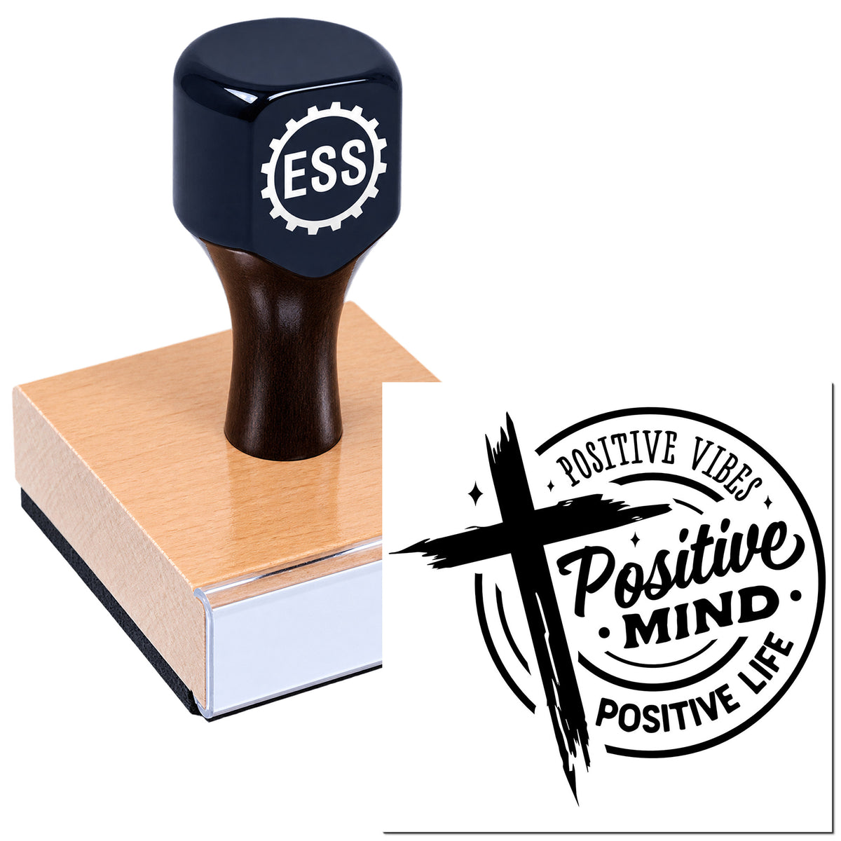 Dark navy ESS rubber stamp on a wooden block beside a black Positive Vibes circular seal.