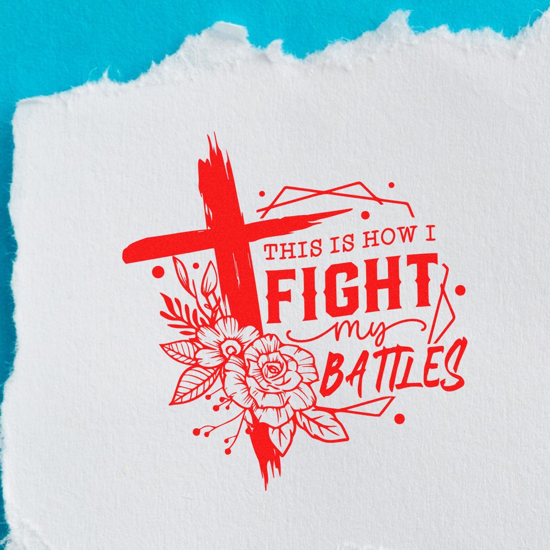 Red faith-themed stamp/seal with floral cross and This Is How I Fight My Battles in red on white paper, turquoise background.
