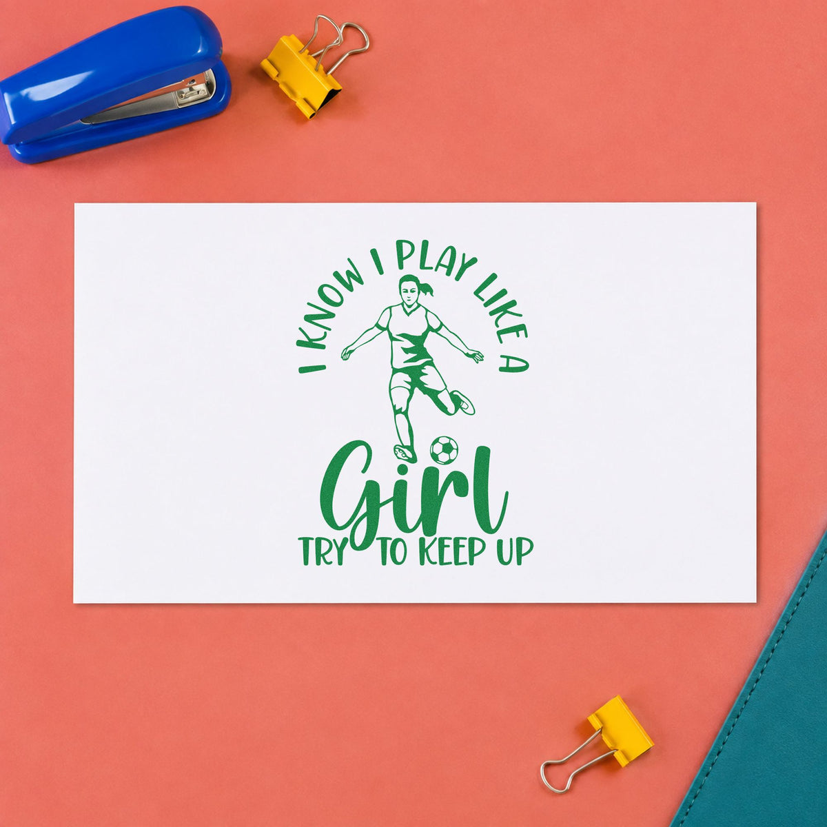 I Play Like a Girl craft stamp imprint in green ink on a handmade project, one idea being locker sign pages.