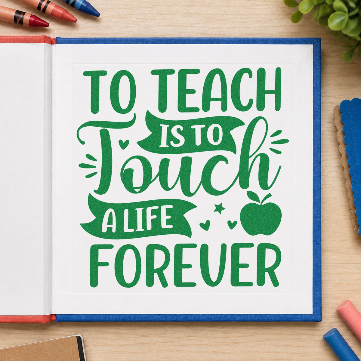 To Teach Is to Touch craft stamp imprint in green ink on a handmade project, one idea being framed library wall.