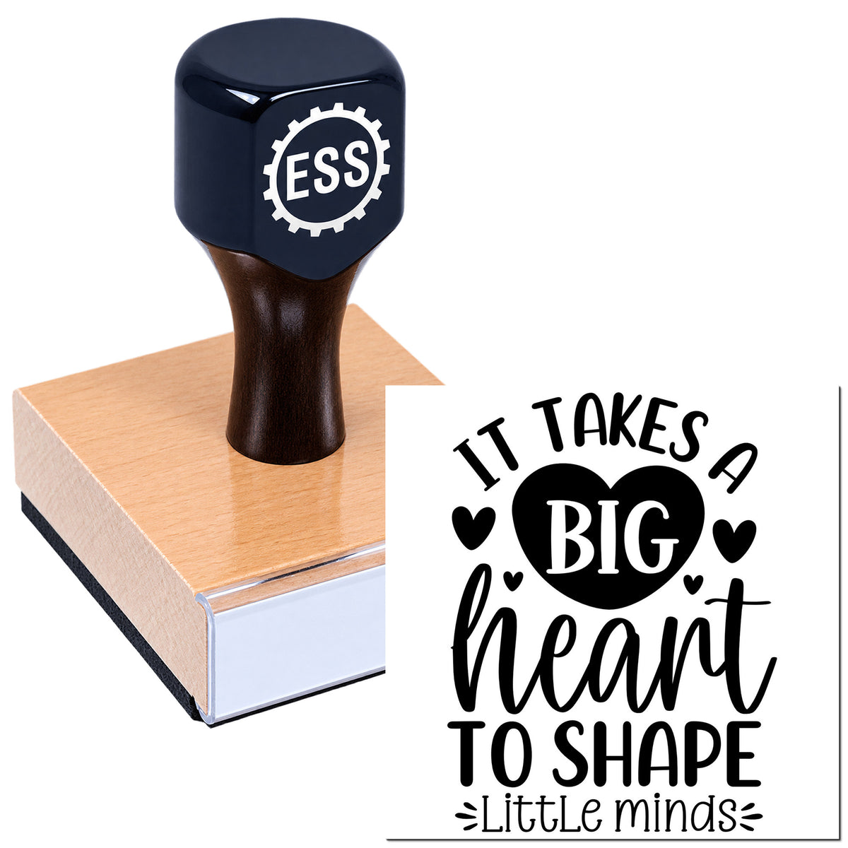 Navy blue ESS stamp and wooden seal block printing a black "It takes a big heart to shape little minds" design on white.