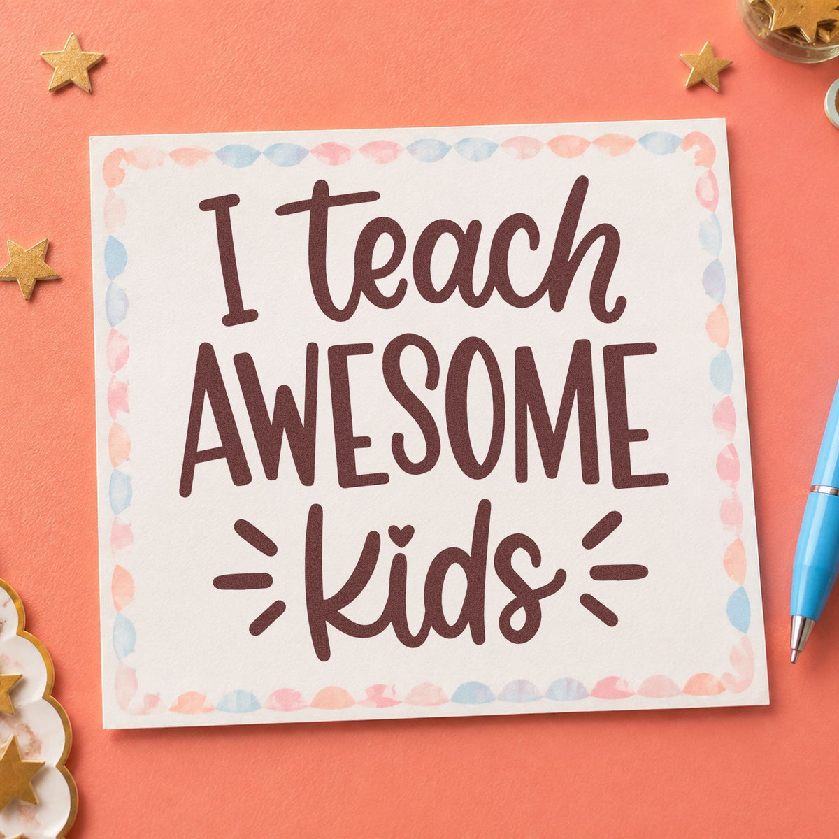 I Teach Awesome Kids rubber stamp printed in brown ink, ready for sensory bin crafts and similar paper crafts.