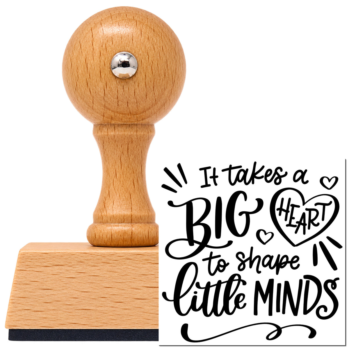 Vintage Pro beech wood stamp with a round knob handle, shown with its black It Takes A Big Heart To Shape Little Minds imprint on white.