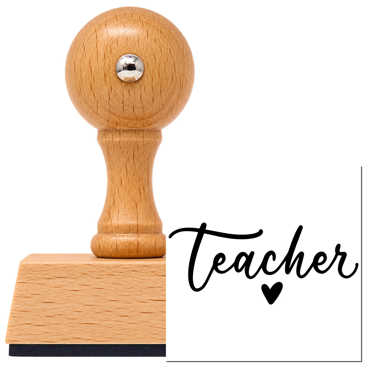 Vintage Pro beech wood stamp with a round knob handle, shown with its black Teacher Script Heart Lettering imprint on white.