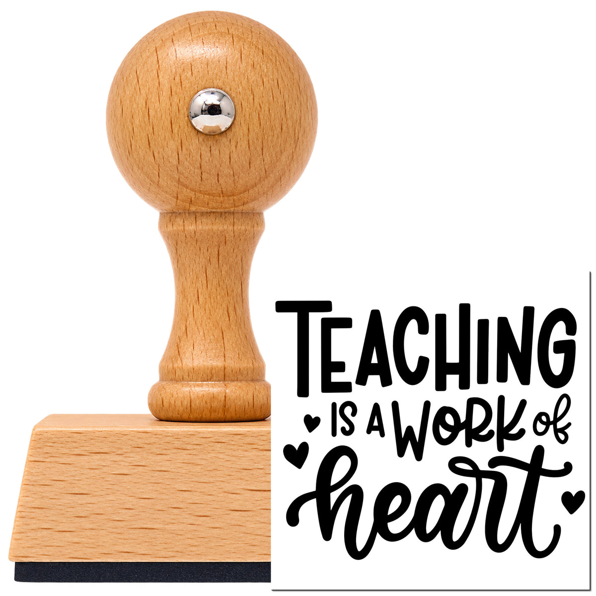Vintage Pro beech wood stamp with a round knob handle, shown with its black Teaching Work Of Heart imprint on white.