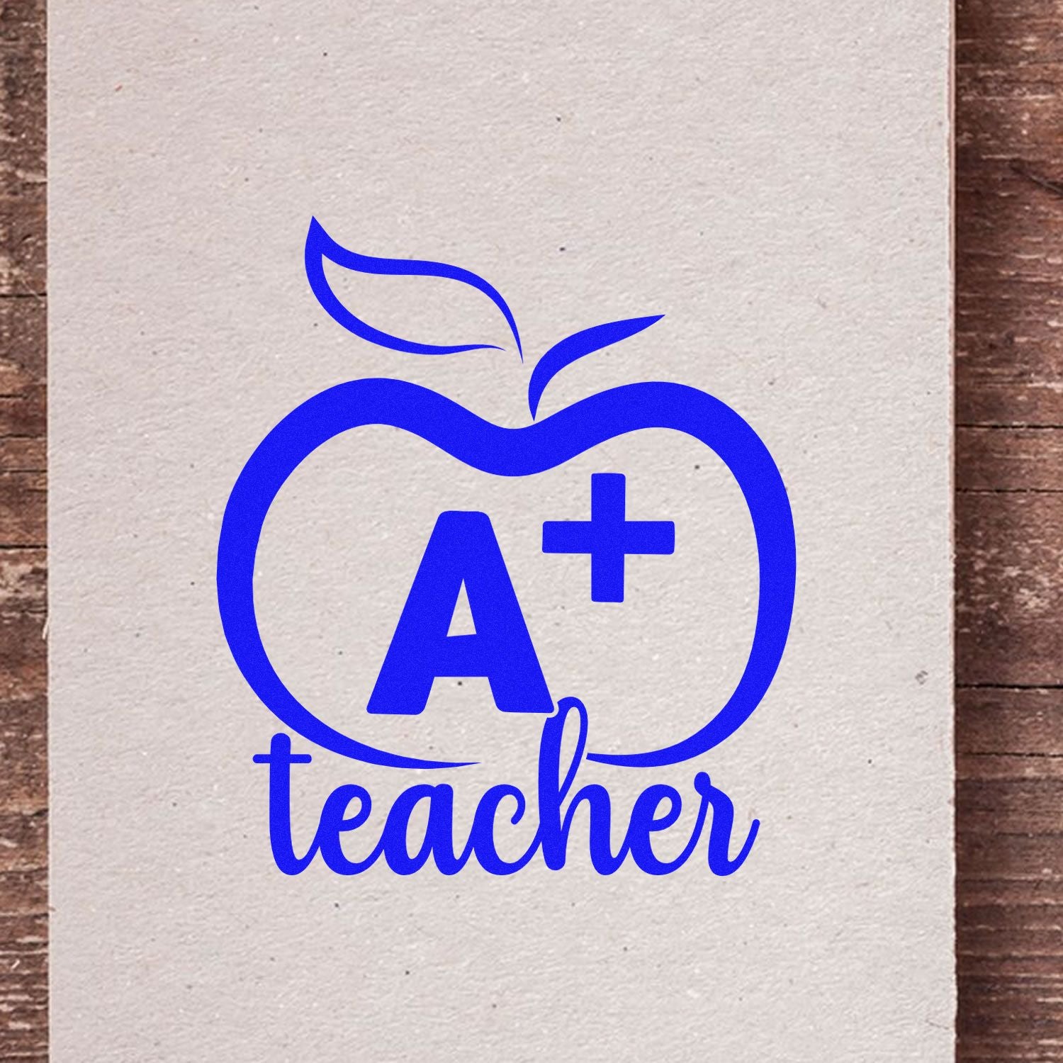 Blue A+ teacher apple stamp and seal design in bright blue on beige paper, with leaf icon and cursive lettering.