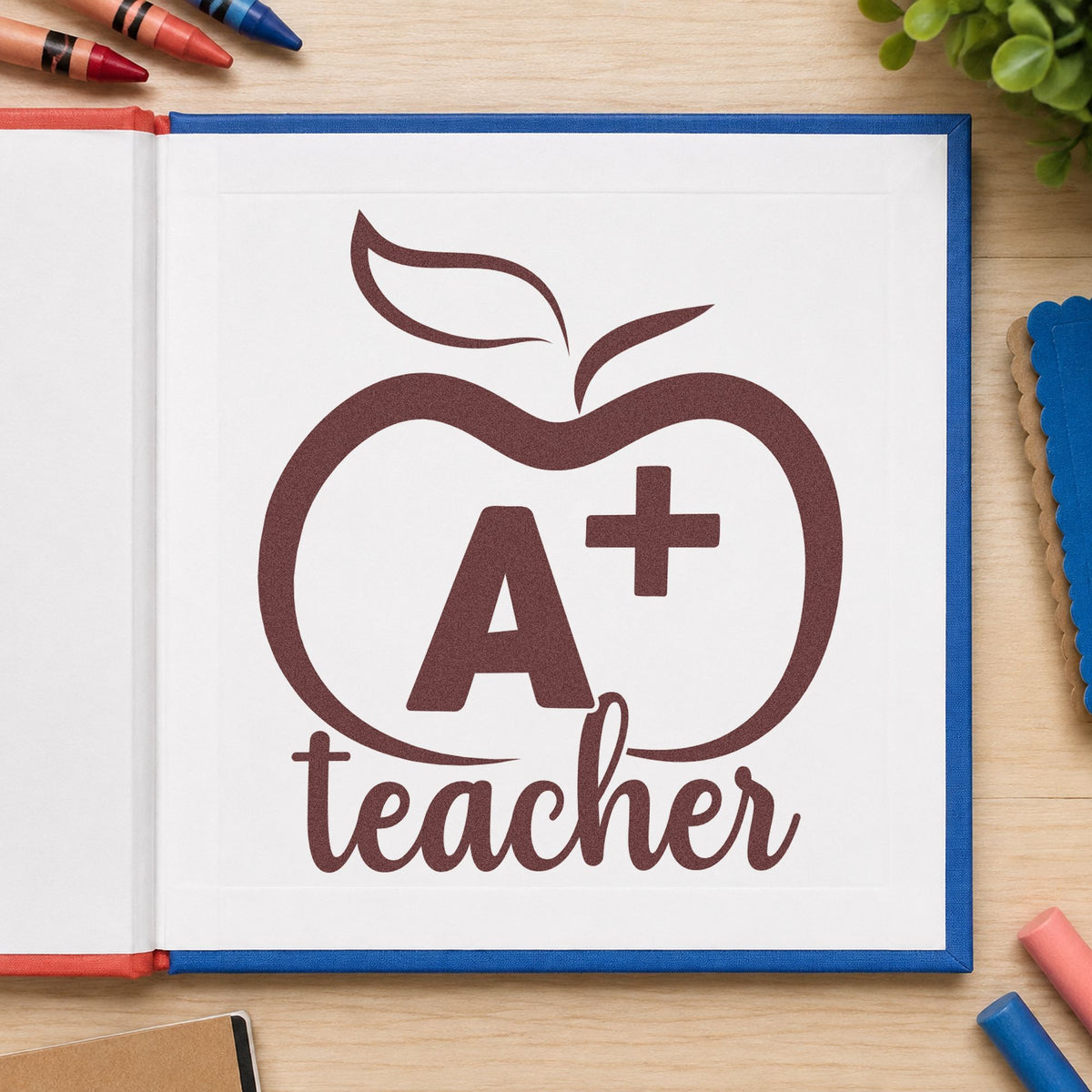 A Plus Teacher Outline Apple rubber stamp printed in brown ink, ready for certificate crafts and similar paper crafts.