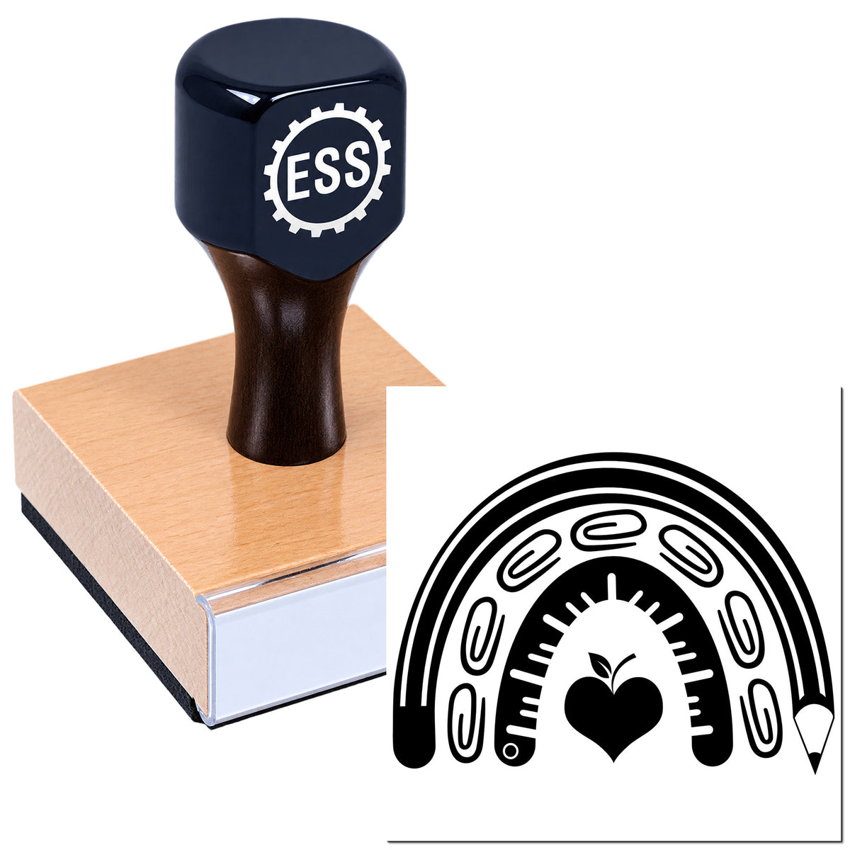 Black ESS rubber stamp on wooden base with matching black seal logo featuring a heart, pencil and rainbow design on white background