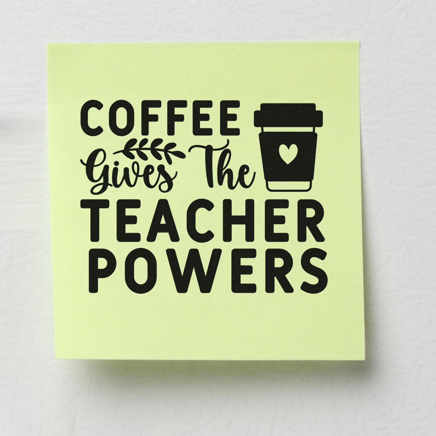 Pale yellow rubber stamp design with black text Coffee gives the teacher powers and a coffee cup icon with heart.