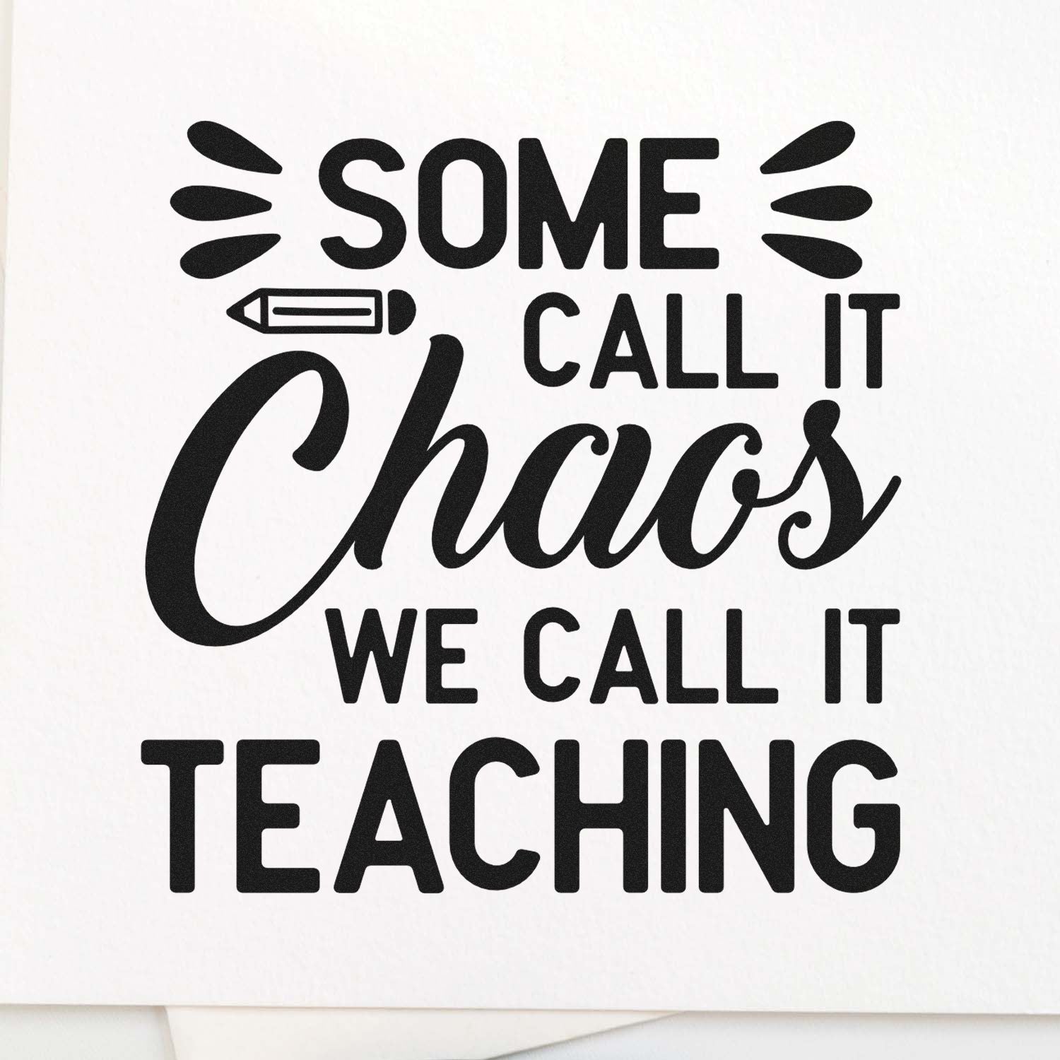 Black rubber stamp design with pencil icon and playful text, Some call it chaos, we call it teaching, on white.