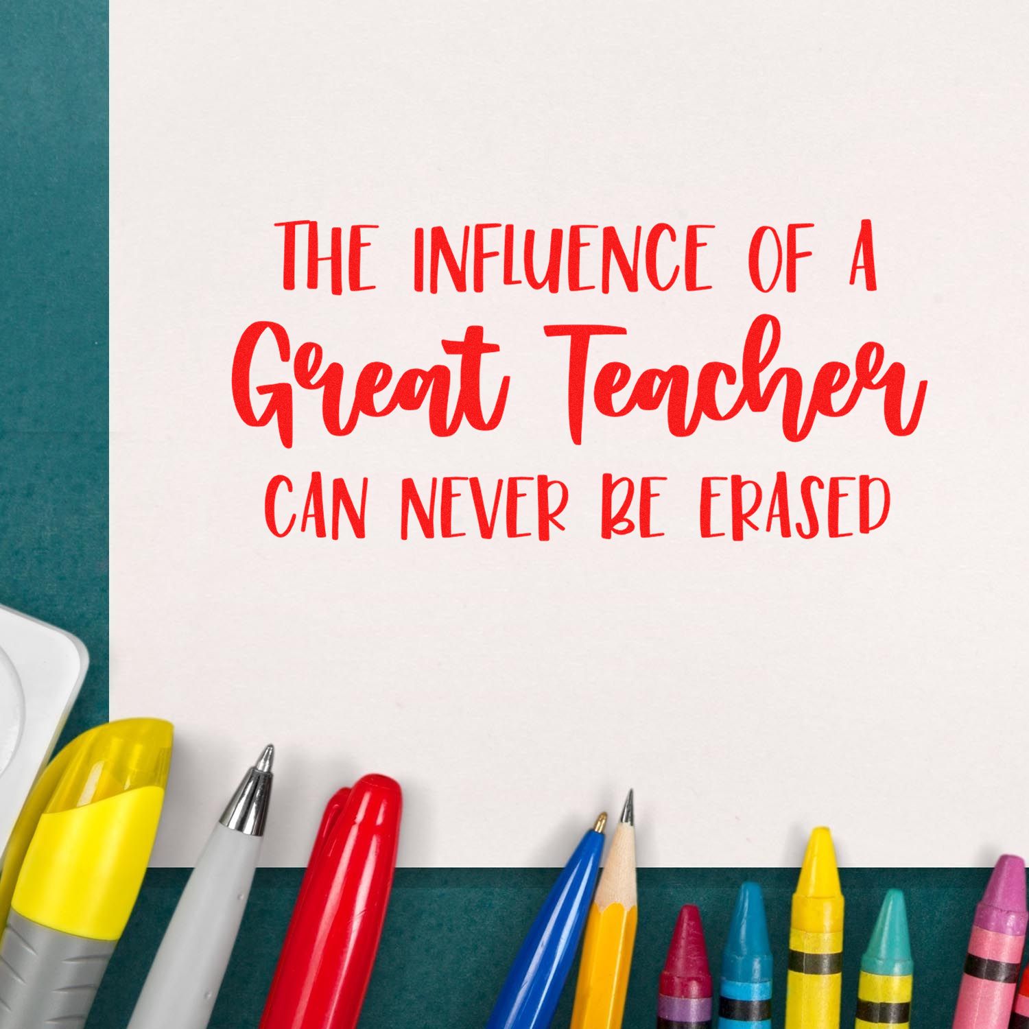 Red teacher appreciation stamp seal on white paper, surrounded by colorful pens on teal background