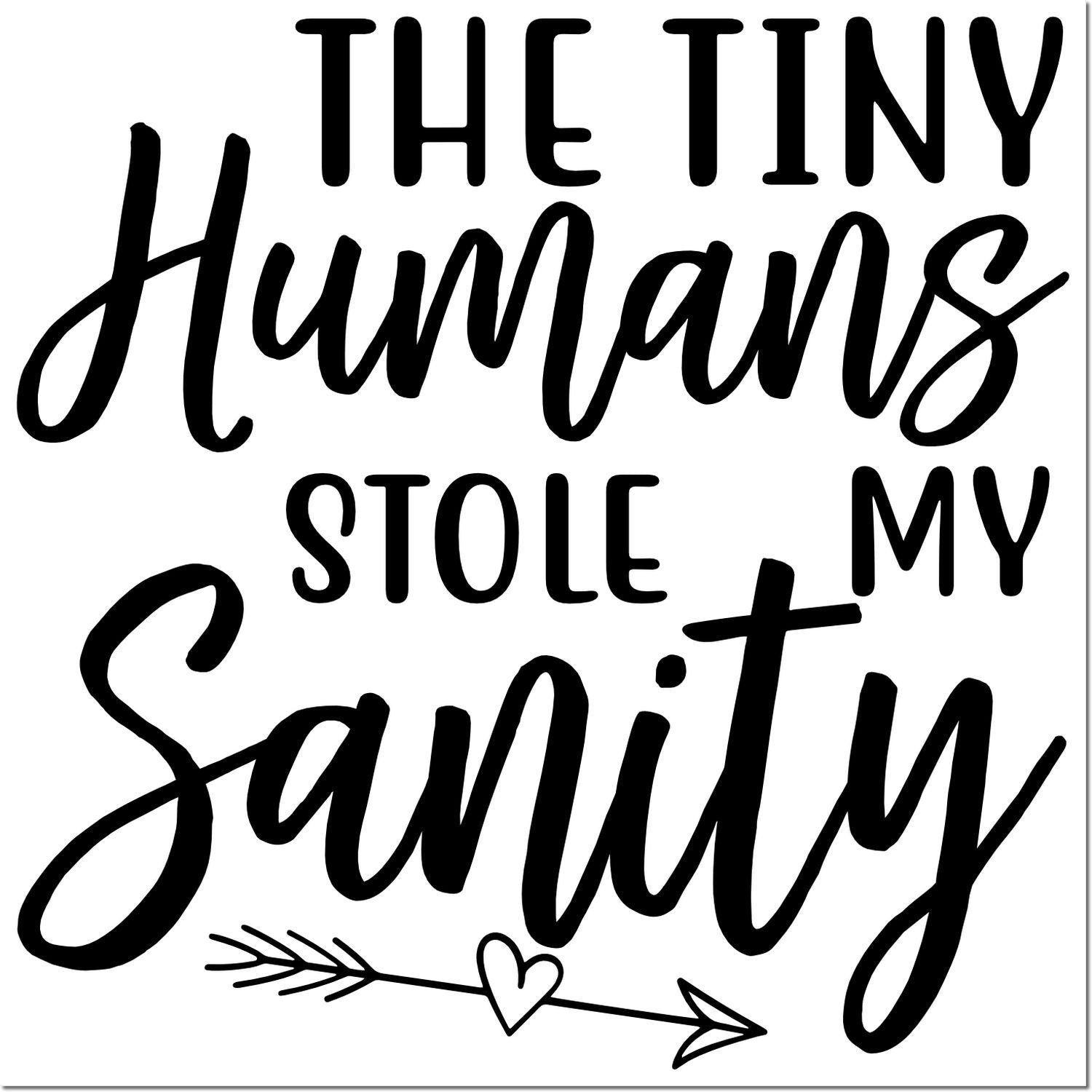 Black stamp/seal design with bold and script text, The tiny humans stole my sanity, plus heart-arrow graphic on white.