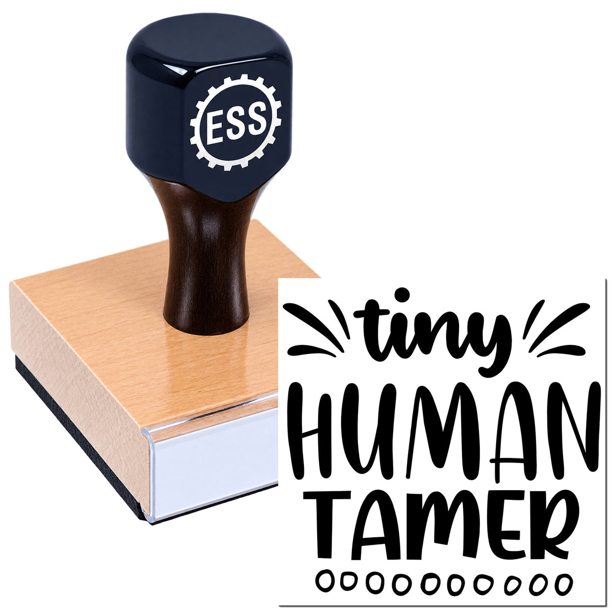 Dark navy ESS rubber stamp on a wooden block beside a black "tiny HUMAN TAMER" seal design.