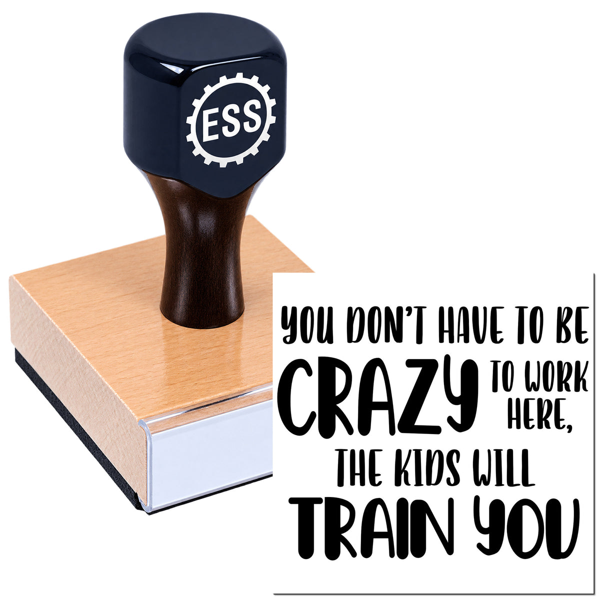 Navy ESS stamp and seal on a pink wood block with white base, beside bold black text: "You don't have to be crazy to work here."
