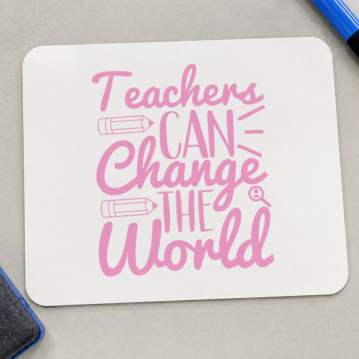 Teachers Can Change World craft stamp in purple ink on cardstock, an easy option for detective kit tags.