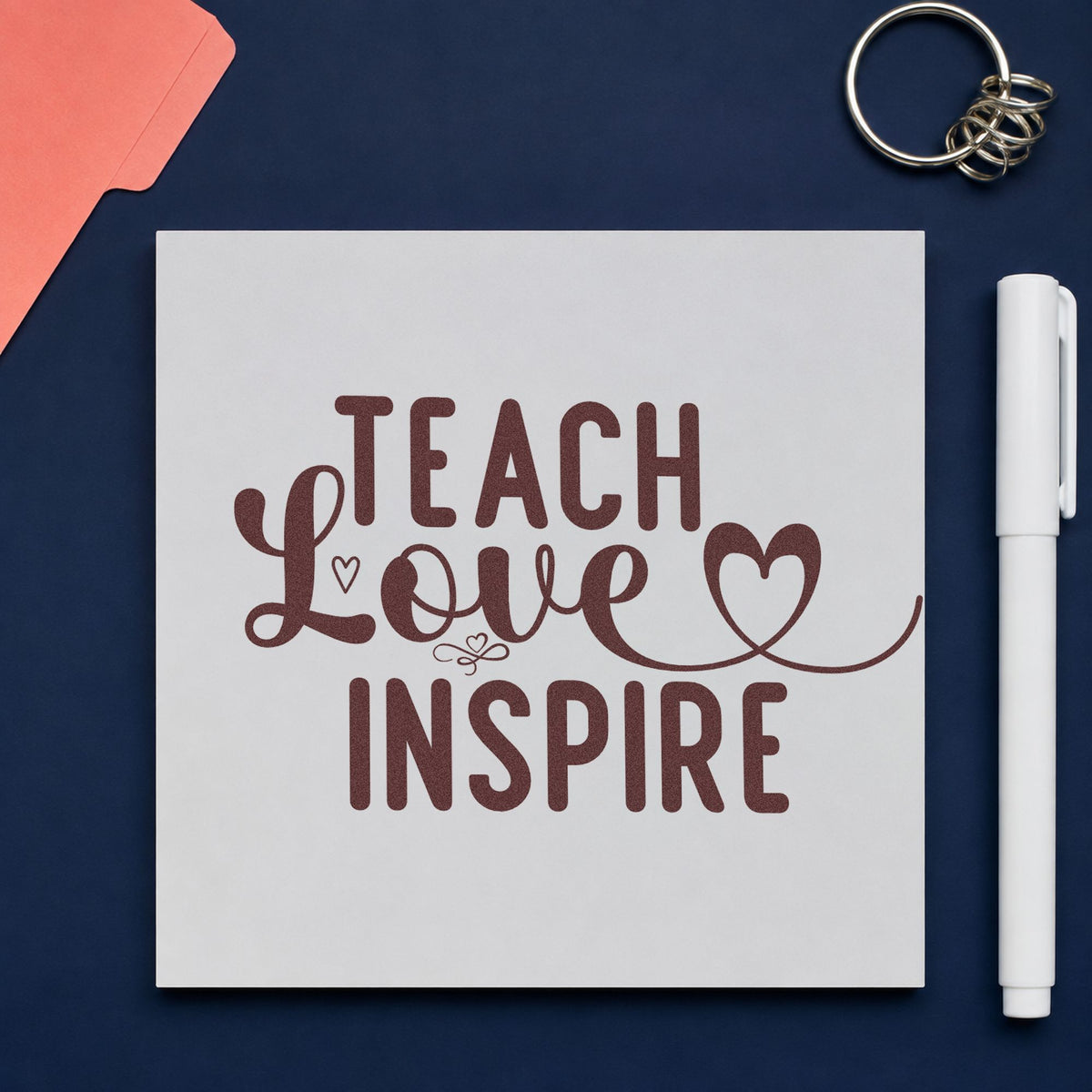 Teach Love Inspire Heart Flourish rubber stamp printed in brown ink, ready for candy tin labels and similar paper crafts.