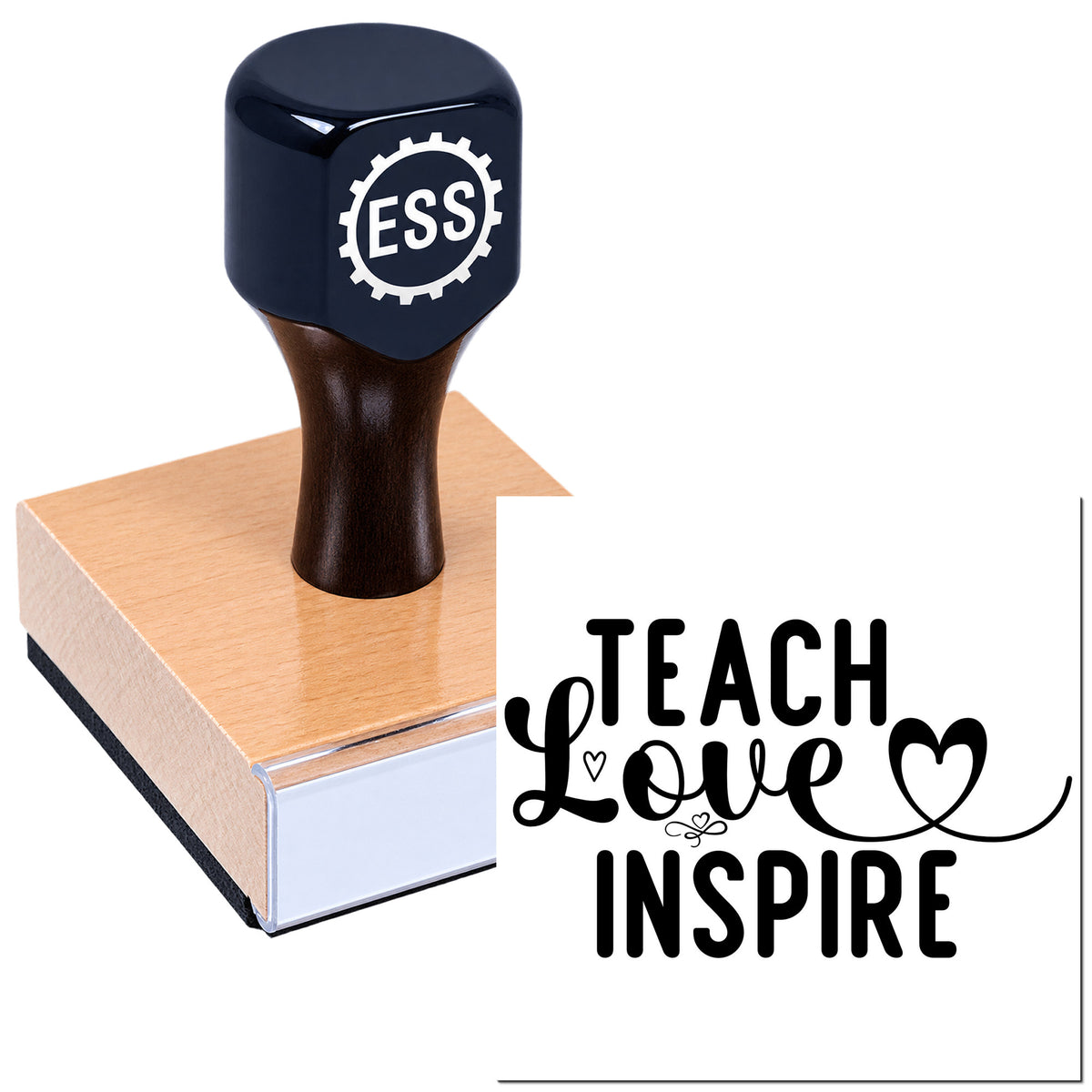 Dark blue ESS rubber stamp and seal on a wood base with "Teach Love Inspire" design and heart graphic.