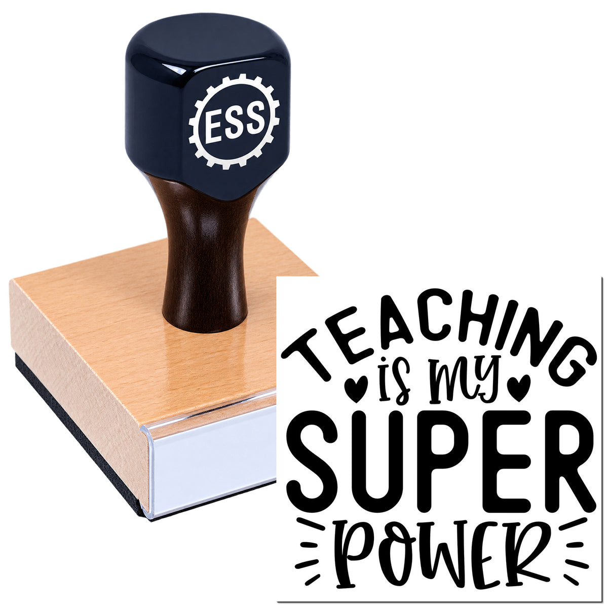 Dark blue ESS self-inking stamp on a pink pad beside a black "Teaching is my super power" seal design.