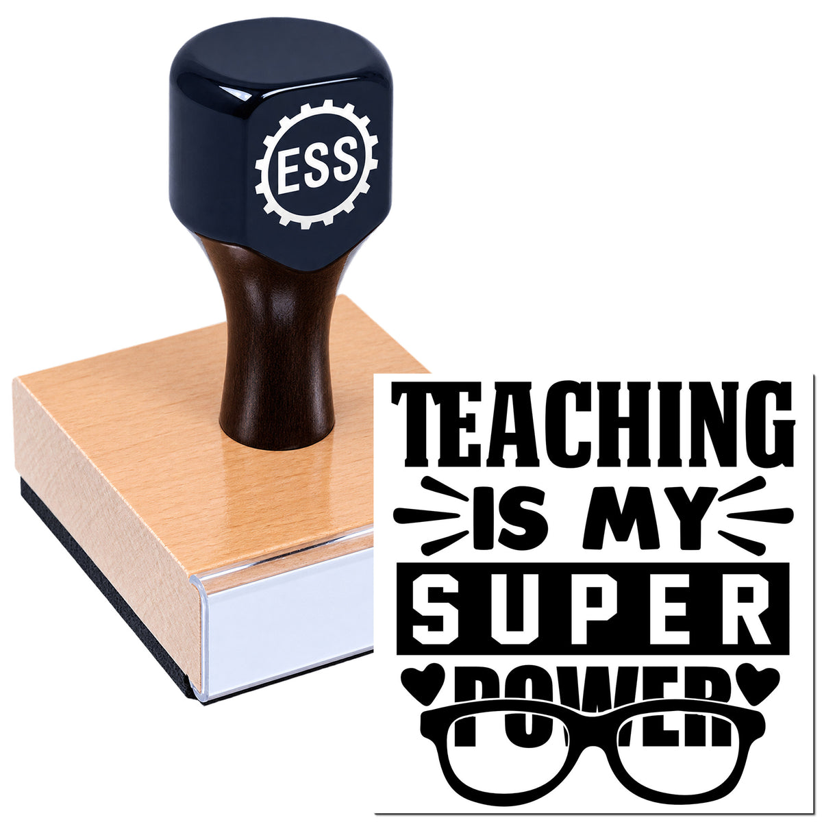 Black ESS teaching stamp on wooden block with bold "TEACHING IS MY SUPER POWER" seal design.