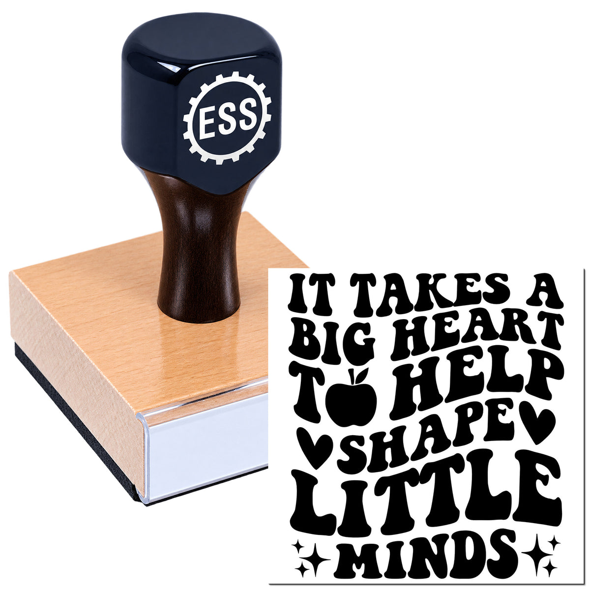 Dark navy ESS rubber stamp seal on a wooden block beside black text: "It takes a big heart to help shape little minds."
