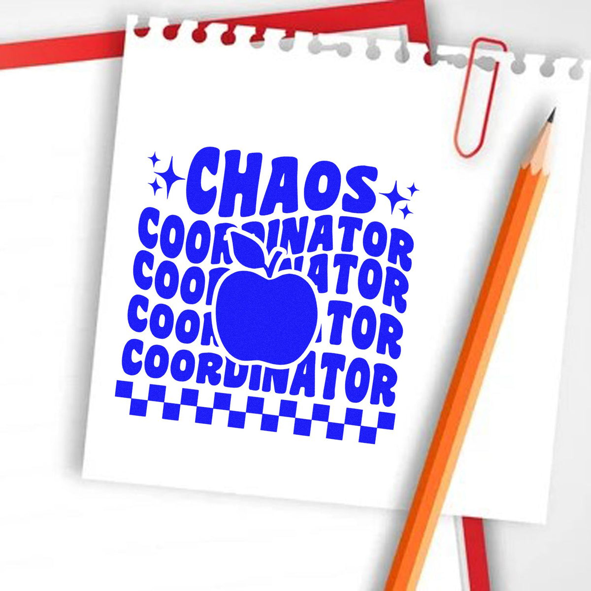 Chaos Coordinator Apple Repeat rubber stamp shown in blue ink, stamped for projects such as wet play tags.