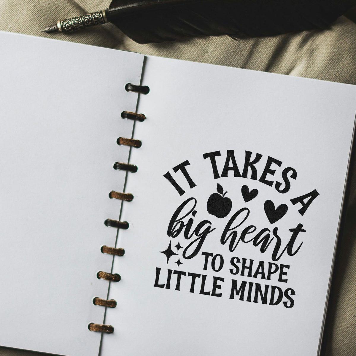 It Takes A Big Heart To Shape Little Minds Apple Premium Wood-Mounted Stamp - Vintage Pro imprint stamped in black ink. "It Takes a Big Heart to Shape Little Minds" is decorated with an apple, hearts, and sparkles.