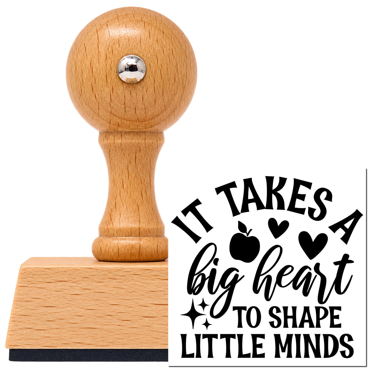Vintage Pro beech wood stamp with a round knob handle, shown with its black It Takes A Big Heart To Shape Little Minds Apple imprint on white.
