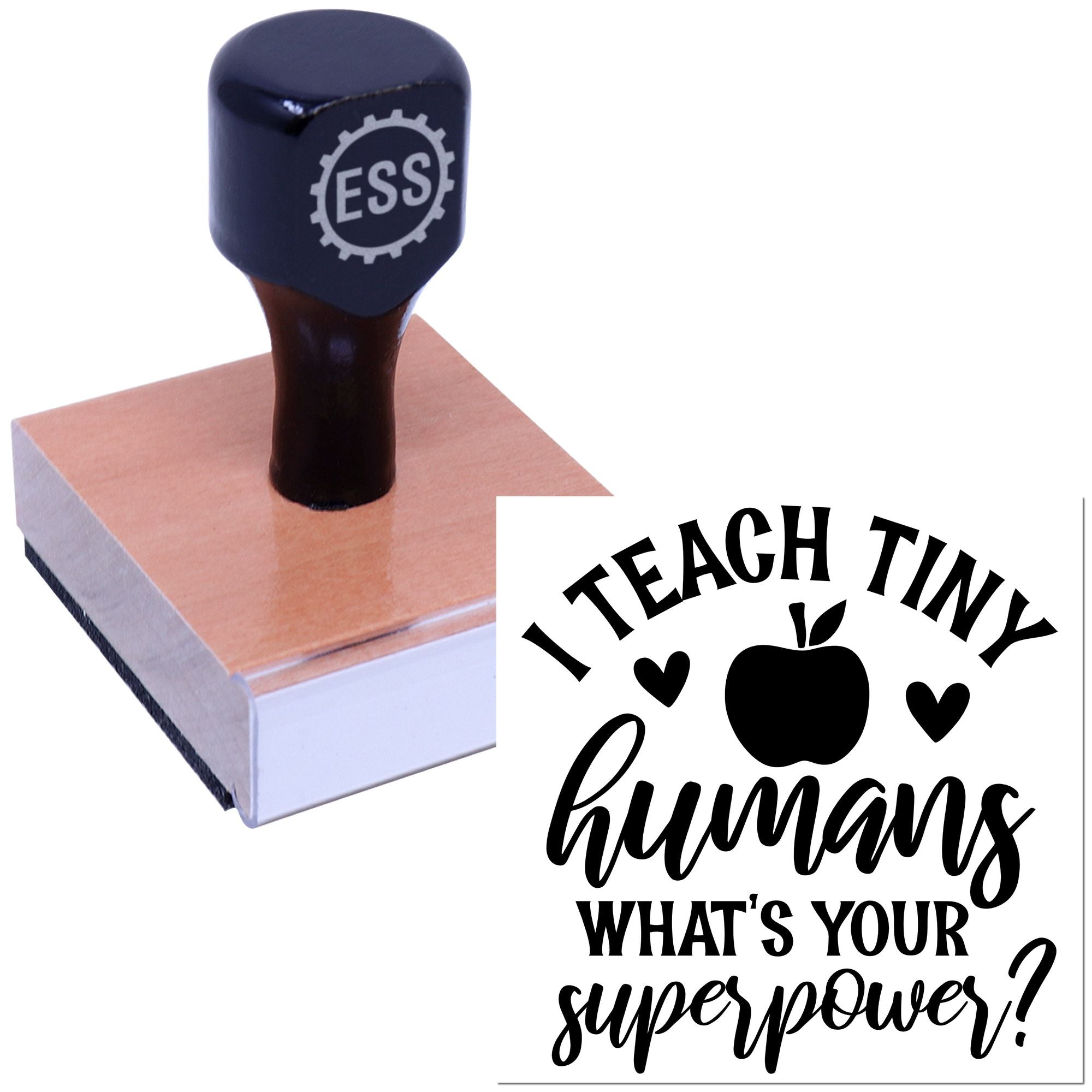 Black ESS rubber stamp on tan wooden base, creating a custom seal with apple and hearts and the text I teach tiny humans.