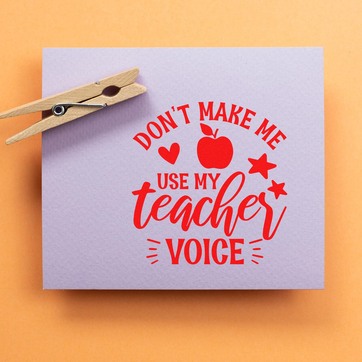 Don't Make Teacher Voice rubber stamp shown in red ink, stamped for projects such as rules display tags.