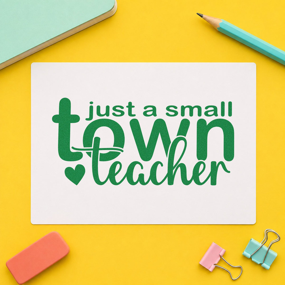 Small Town Teacher craft stamp imprint in green ink on a handmade project, one idea being parish news pages.