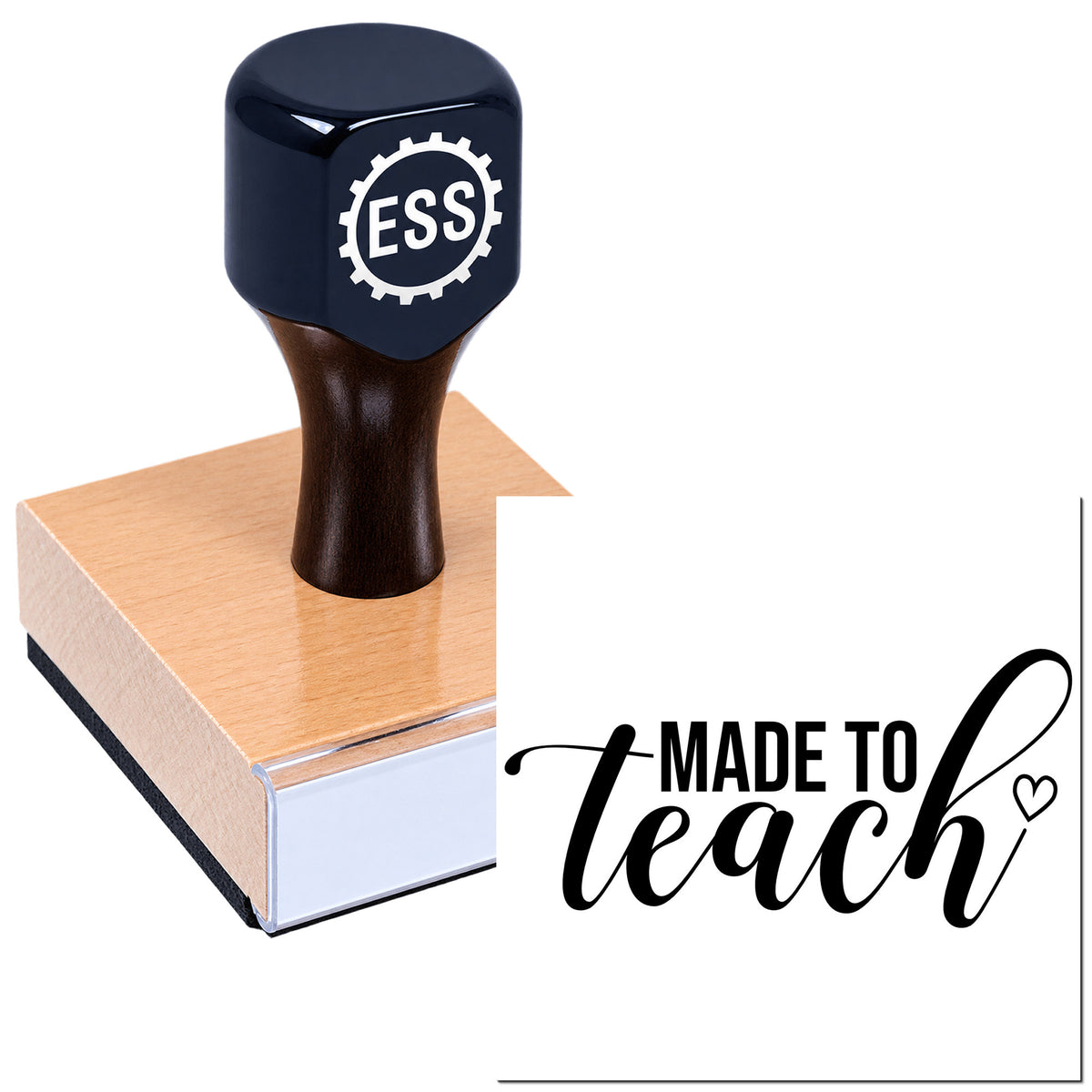 Dark navy ESS custom stamp on a tan wooden base, with white logo and "Made to Teach" lettering.