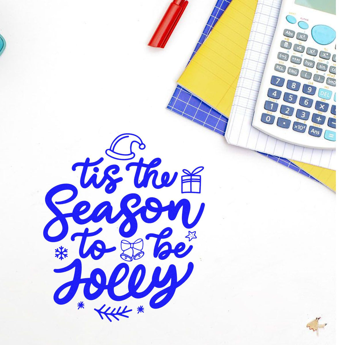 Blue holiday stamp and seal design reading Tis the Season to Be Jolly with Santa hat, gift, and snowflake icons.