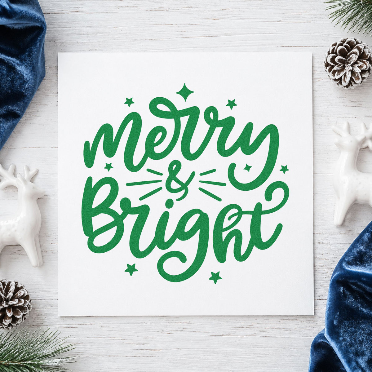 Merry And Bright Stars craft stamp imprint in green ink on a handmade project, one idea being framed window glow.