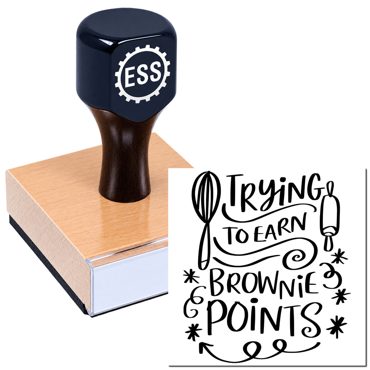 Black ESS stamp and seal on a wood block, featuring a decorative "Trying to earn brownie points" design.