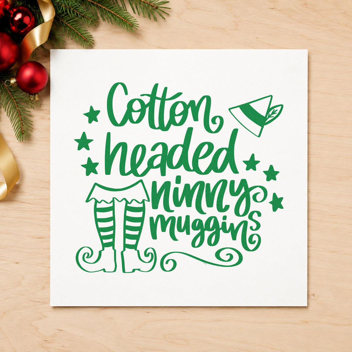 Cotton Headed Ninny Muggins craft stamp imprint in green ink on a handmade project, one idea being framed den corner.