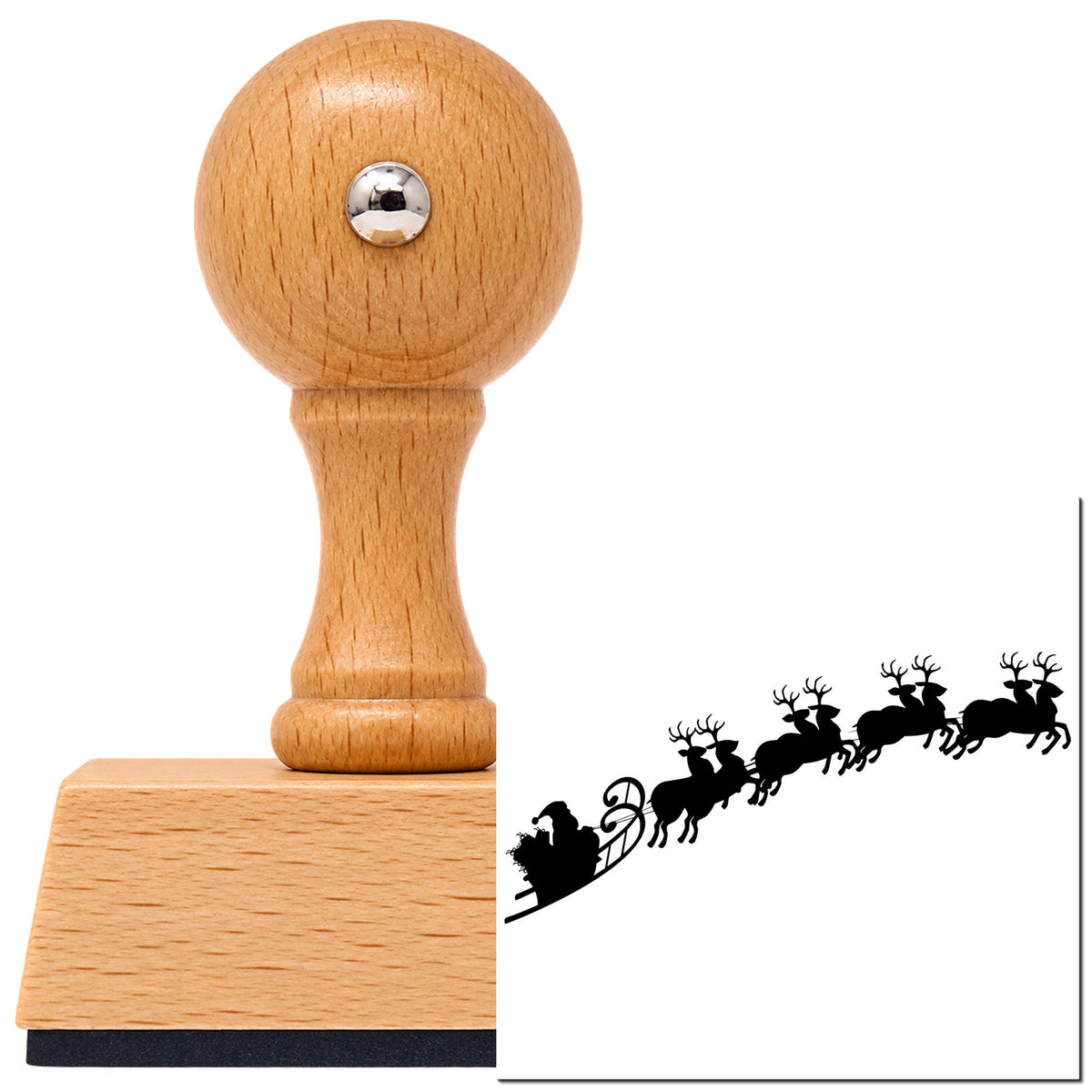 Vintage Pro beech wood stamp with a round knob handle, shown with its black Santa Sleigh And Reindeer imprint on white.