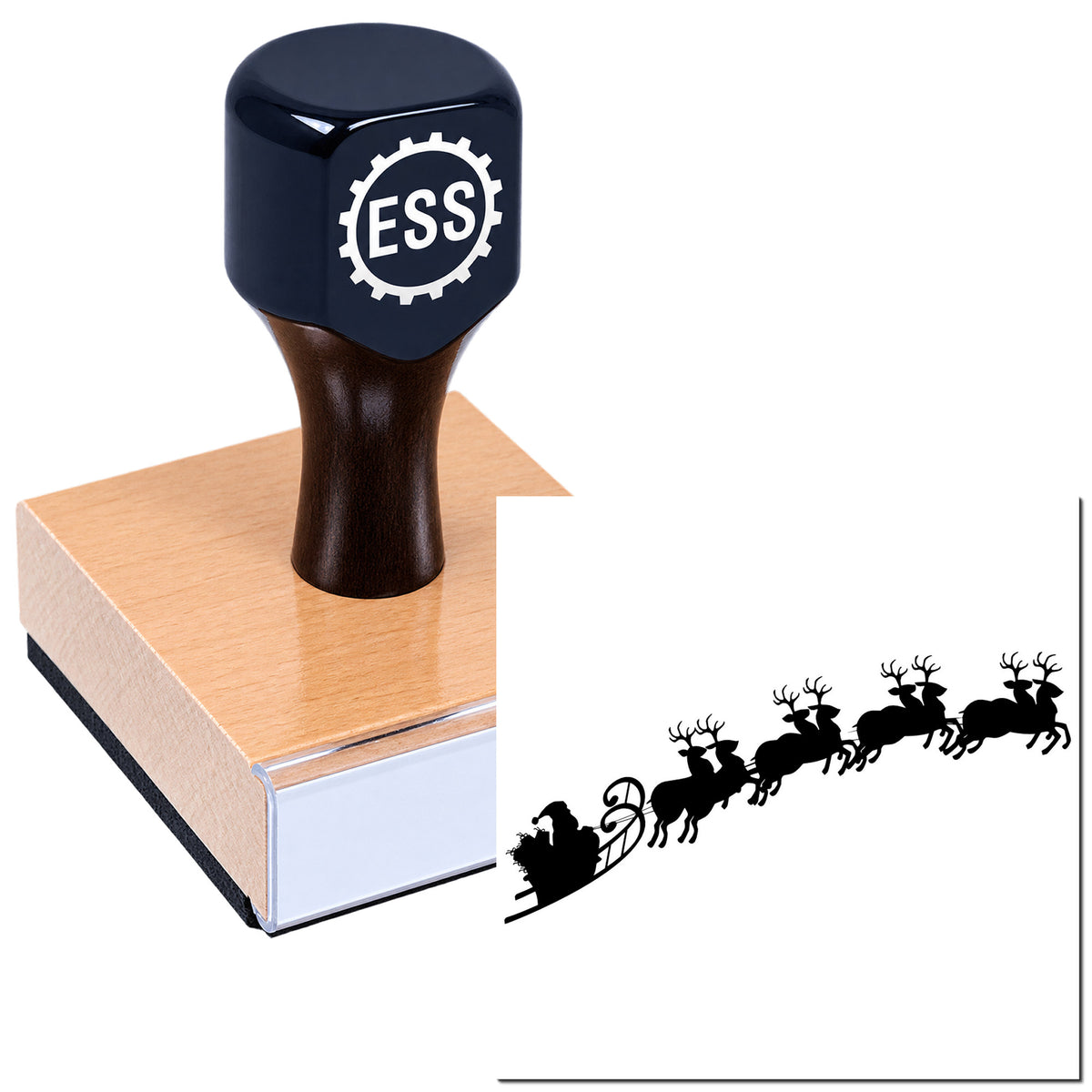 Dark blue ESS rubber stamp on pink base with black Santa sleigh and reindeer seal design on white background.