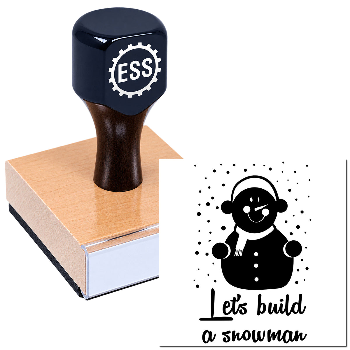 Black ESS self-inking stamp on a pink wood block beside a snowman seal design with dots and "Let's build a snowman" text.