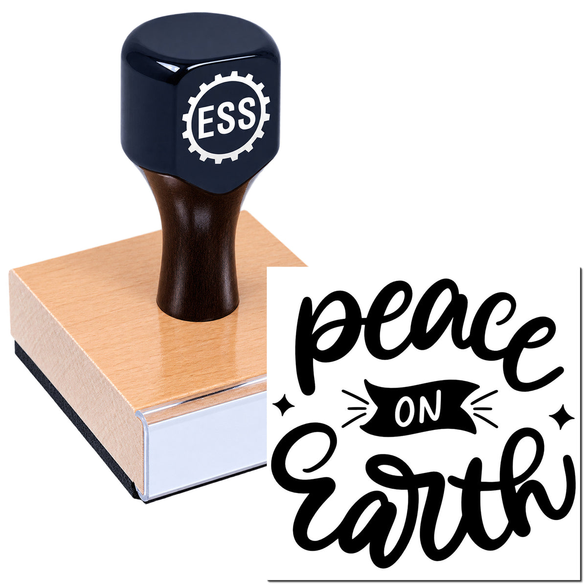 Black ESS rubber stamp and seal on a wooden block, with "peace on earth" in bold black script.