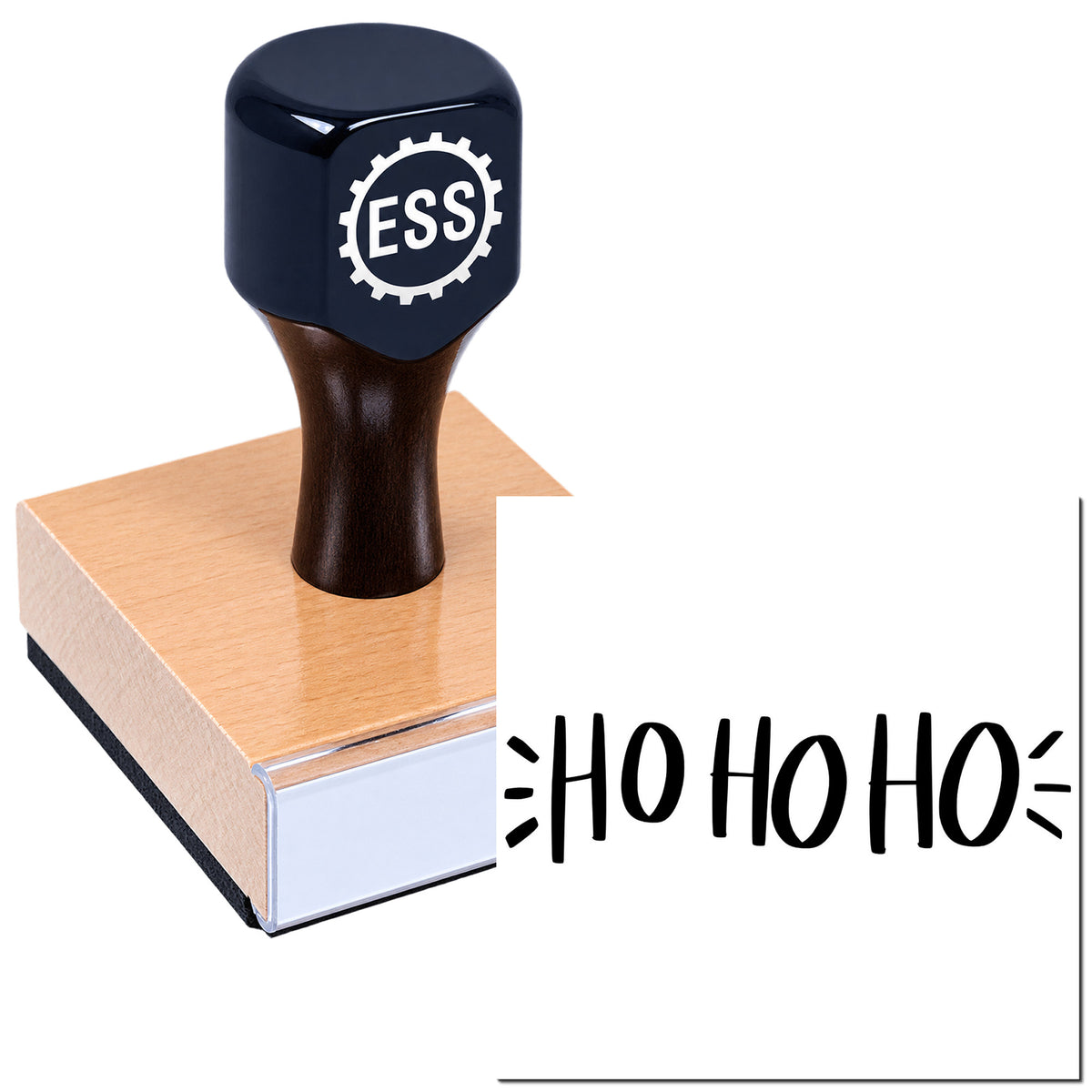 Black ESS seal stamp on wooden block, imprinting bold black "HO HO HO" on white.