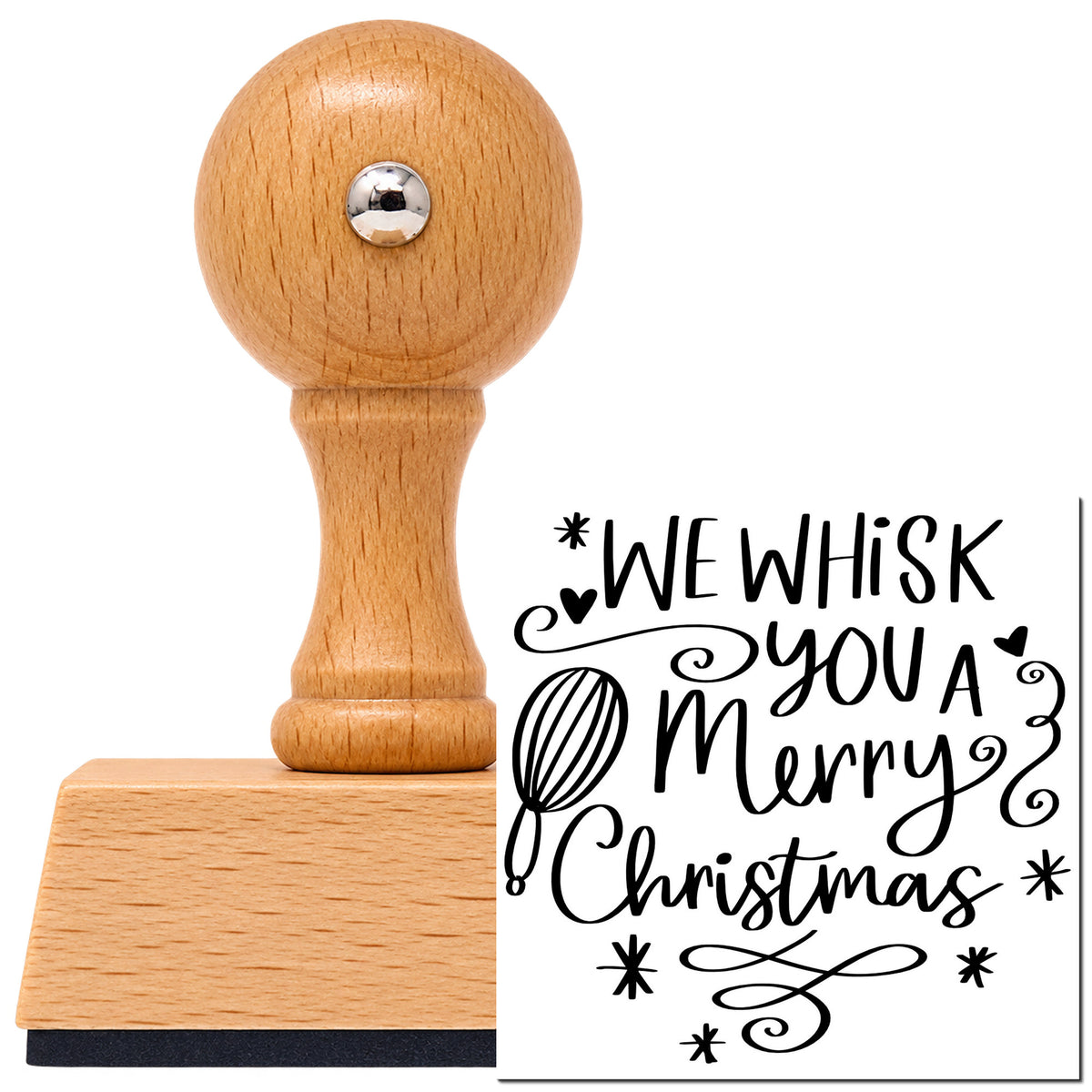Vintage Pro beech wood stamp with a round knob handle, shown with its black We Whisk Merry Christmas imprint on white.