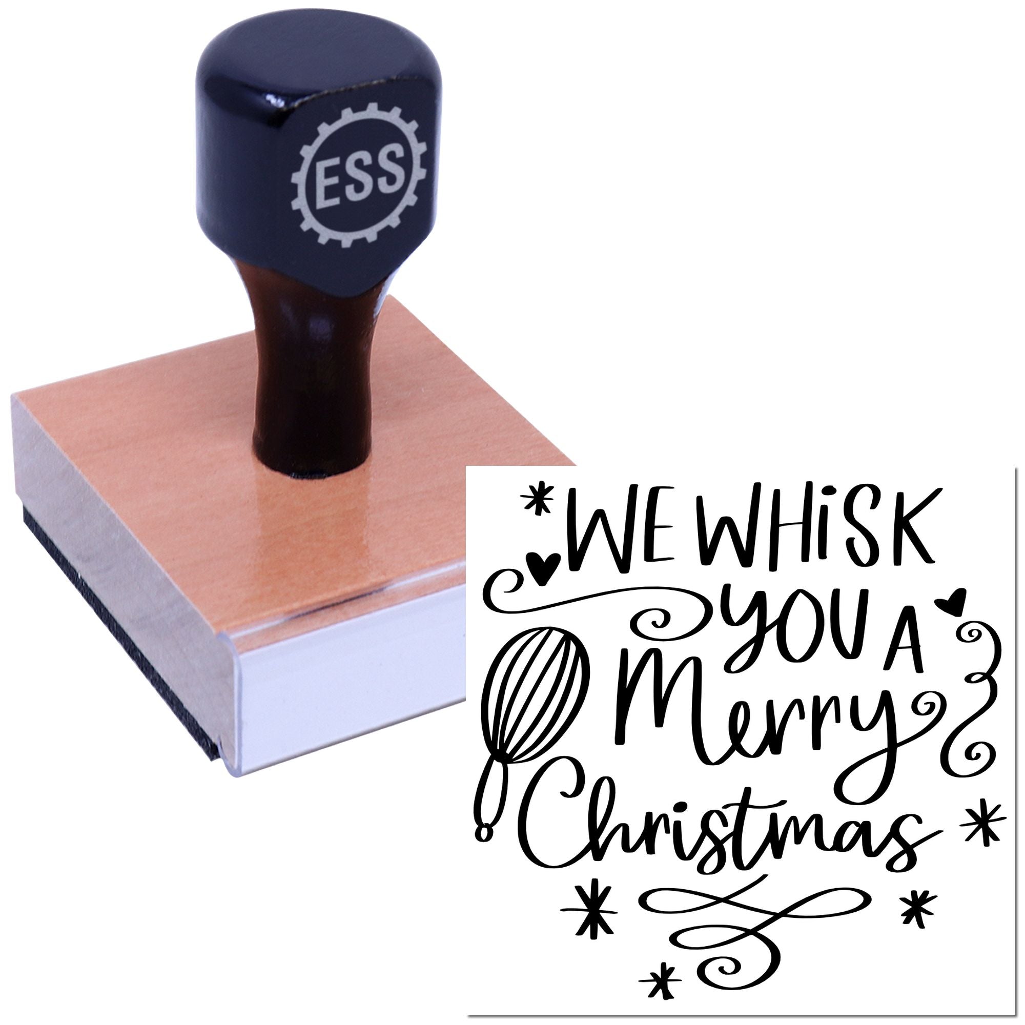 Dark blue ESS rubber stamp on pink wooden block, with black script seal reading We Whisk You a Merry Christmas
