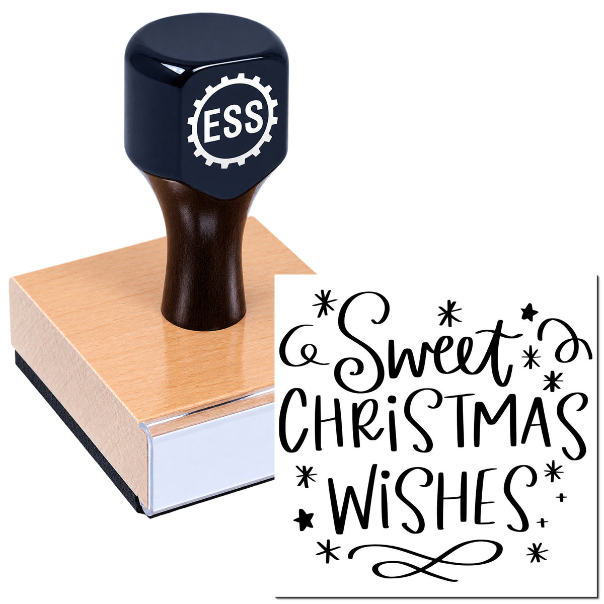 Black ESS stamp and seal on a wooden block, showing a black "Sweet Christmas Wishes" script design.