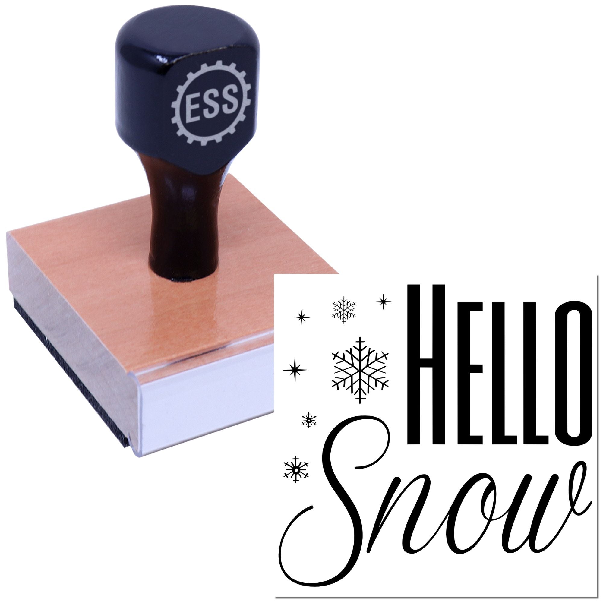 Dark navy ESS rubber stamp on tan block beside black HELLO Snow seal with snowflake accents