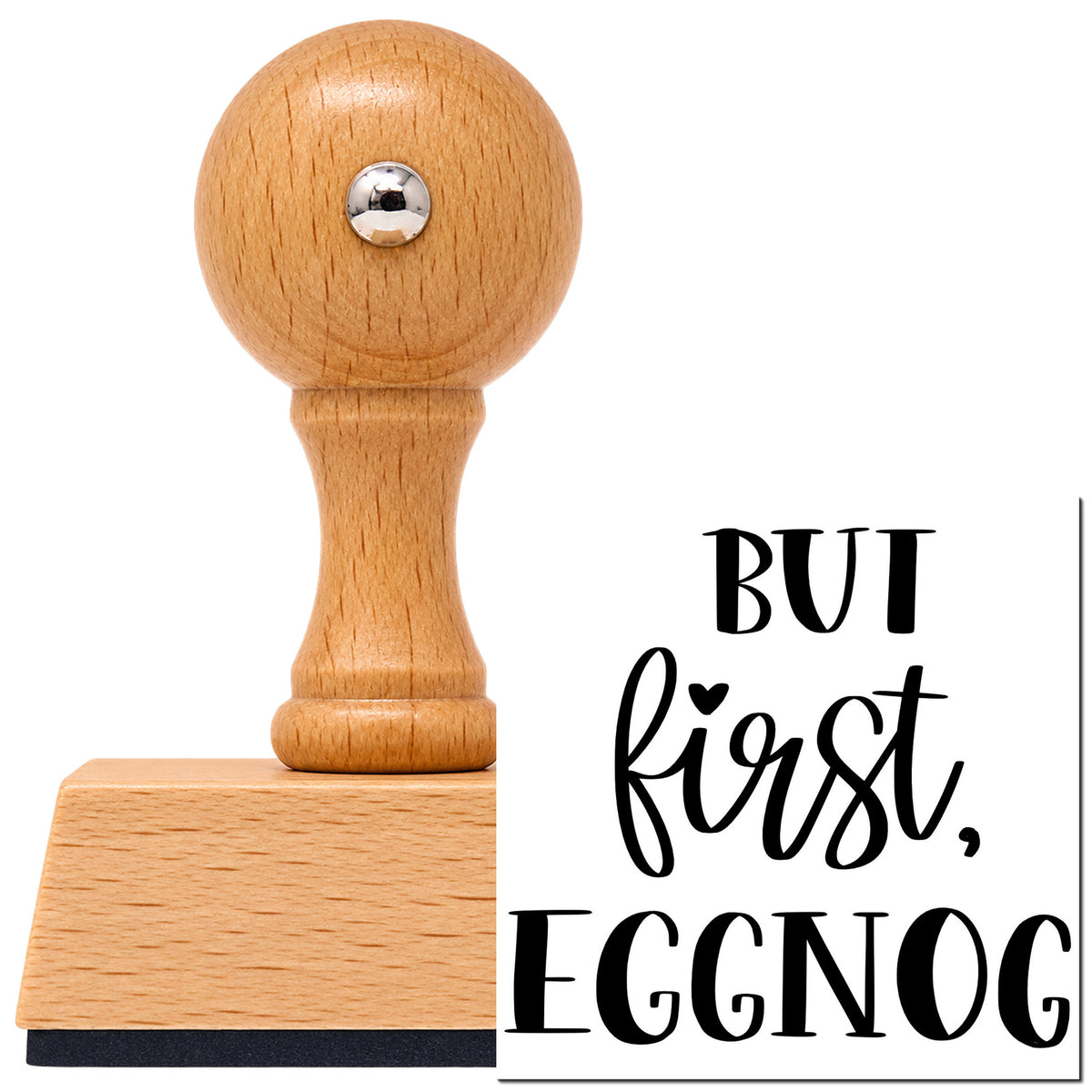 Vintage Pro beech wood stamp with a round knob handle, shown with its black But First Eggnog imprint on white.
